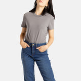 Sophia (A woman with long black hair) wears the No Limbits Adaptive Women's Charcoal Sensory Tee.