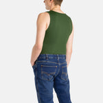 The back of a white man with short brown hair wearing an olive-green tank top and denim jeans.
