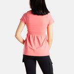 The back of Sophia (A woman with long black hair), wearing the No Limbits Adaptive Women's Coral Sensory Blouse with black leggings.