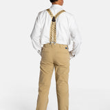 The back of a white, elderly man with a mustache wearing the No Limbits Adaptive Men's Khaki Unlimbited Pants, with a white shirt, tan suspenders, and brown shoes.