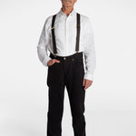 A white, elderly man with a mustache wears the No Limbits Adaptive Men's Black Unlimbited Pants, with a white shirt, brown suspenders, and brown shoes.
