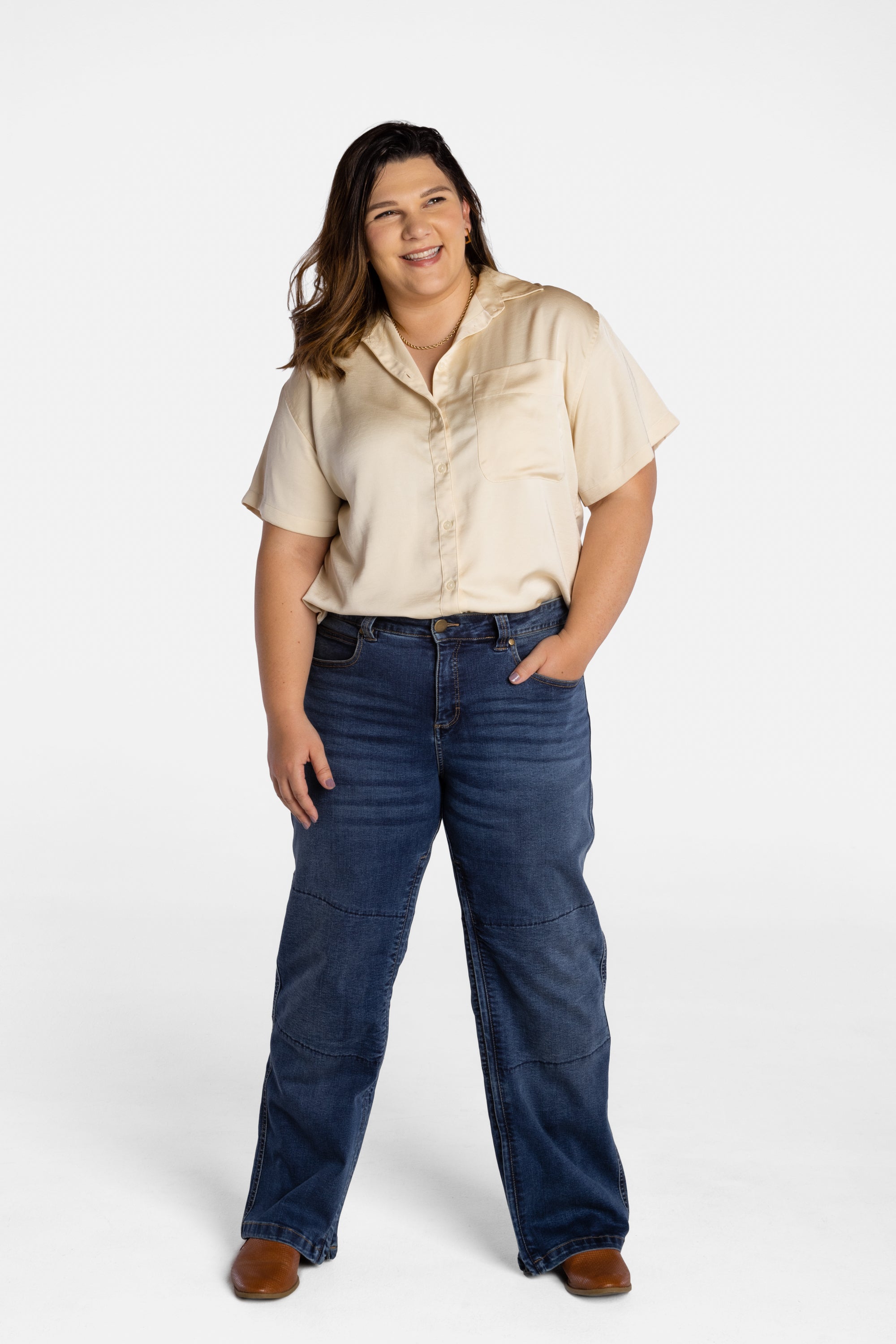 Erica Cole, the founder of No Limbits, wears the No Limbits Adaptive Women's Dark Wash Unlimbited Pants.