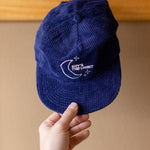 Someone puts the "Sky's the Limbits" hat on a hook.