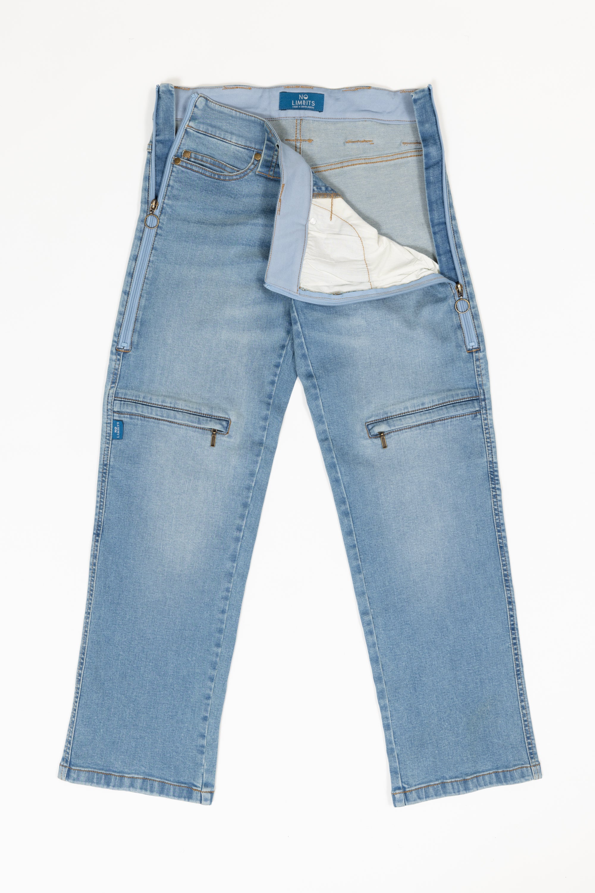 The thigh pocket from the pants unzips the whole thigh.