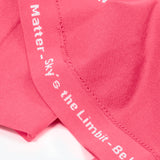 A seam of the shirt has gray words that say "You Matter - Sky's the Limbit - Not All Disabilities are Visual."