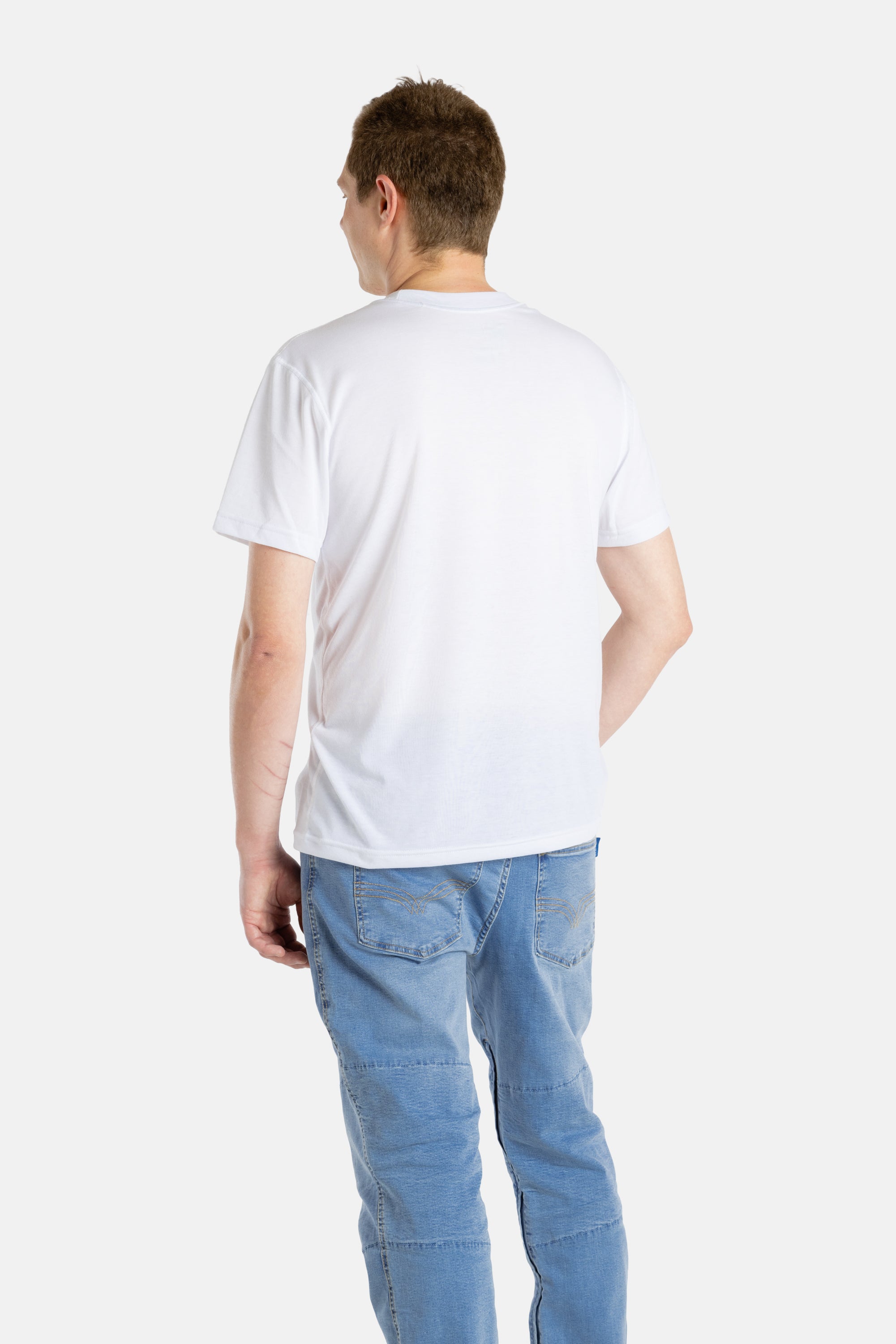 The back of a white man with short brown hair wearing a white t-shirt.
