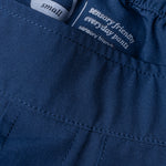 Close-up image of sensory friendly waistband. Both interior and exterior seams are flat. 