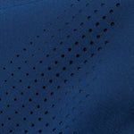 Close-up image of laser cut holed on legs of pant