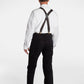 The back of a white, elderly man, wearing the No Limbits Adaptive Men's Black Unlimbited Pants, with a white shirt, brown suspenders, and brown shoes.